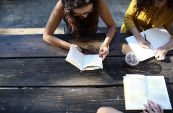 girls writing in their journels together